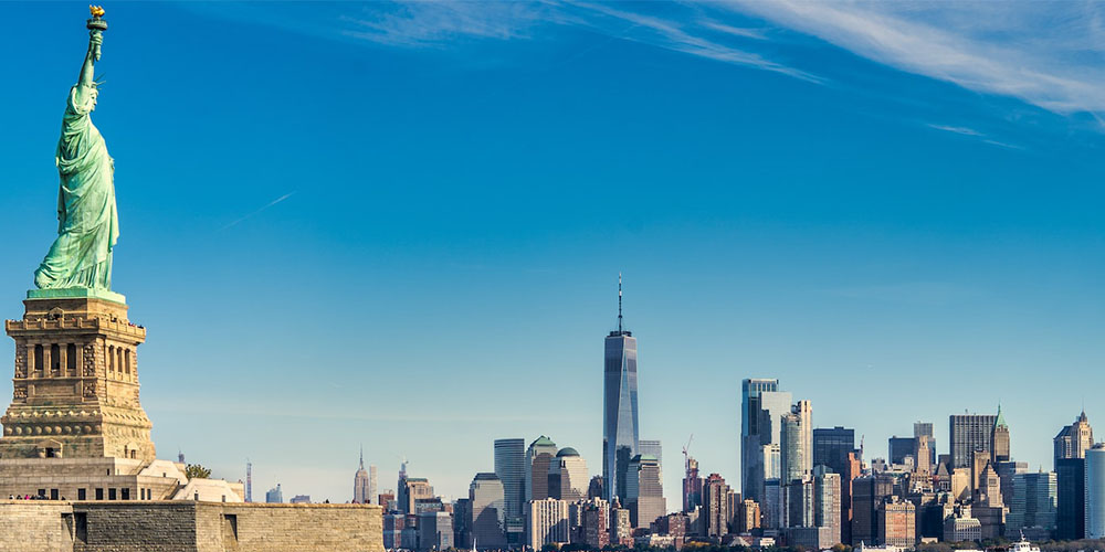 New York City: Statue of Liberty & Ellis island - Credit: pierre-blache-VMNG8BYFQfs-unsplash